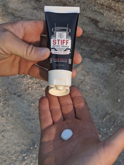 Stiff Mother Trucker Pain Relief Cream in Hand